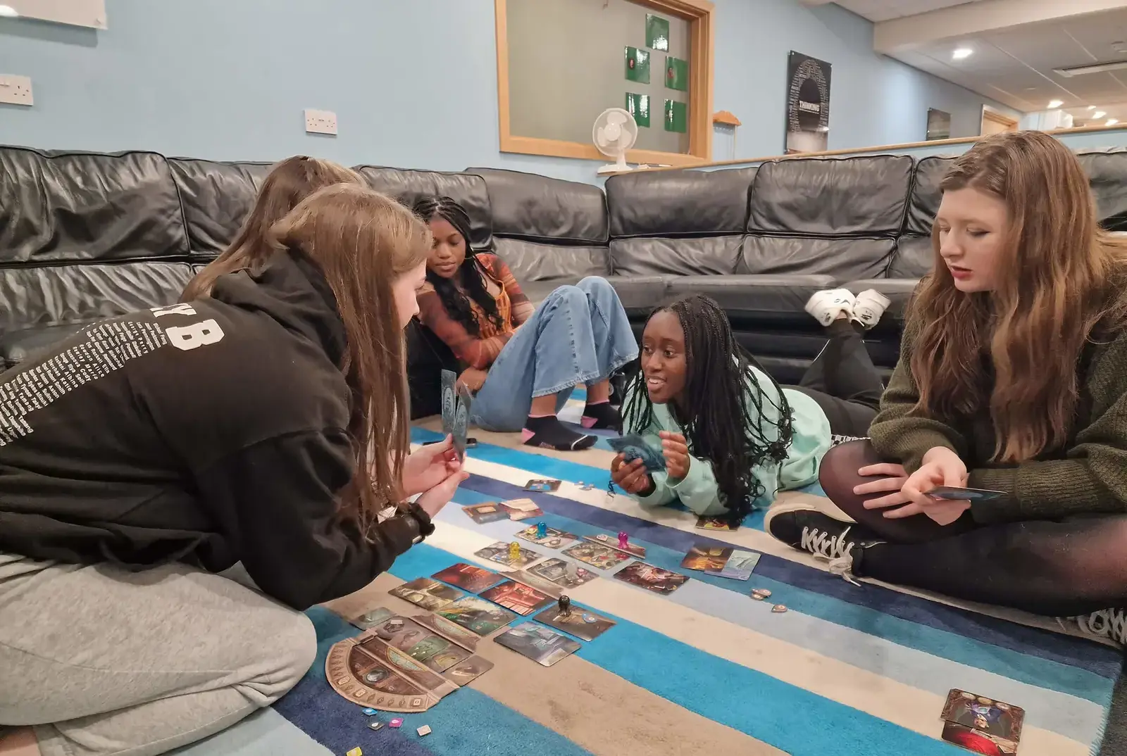 Boarding pupils at Queen Ethelburga's playing games together