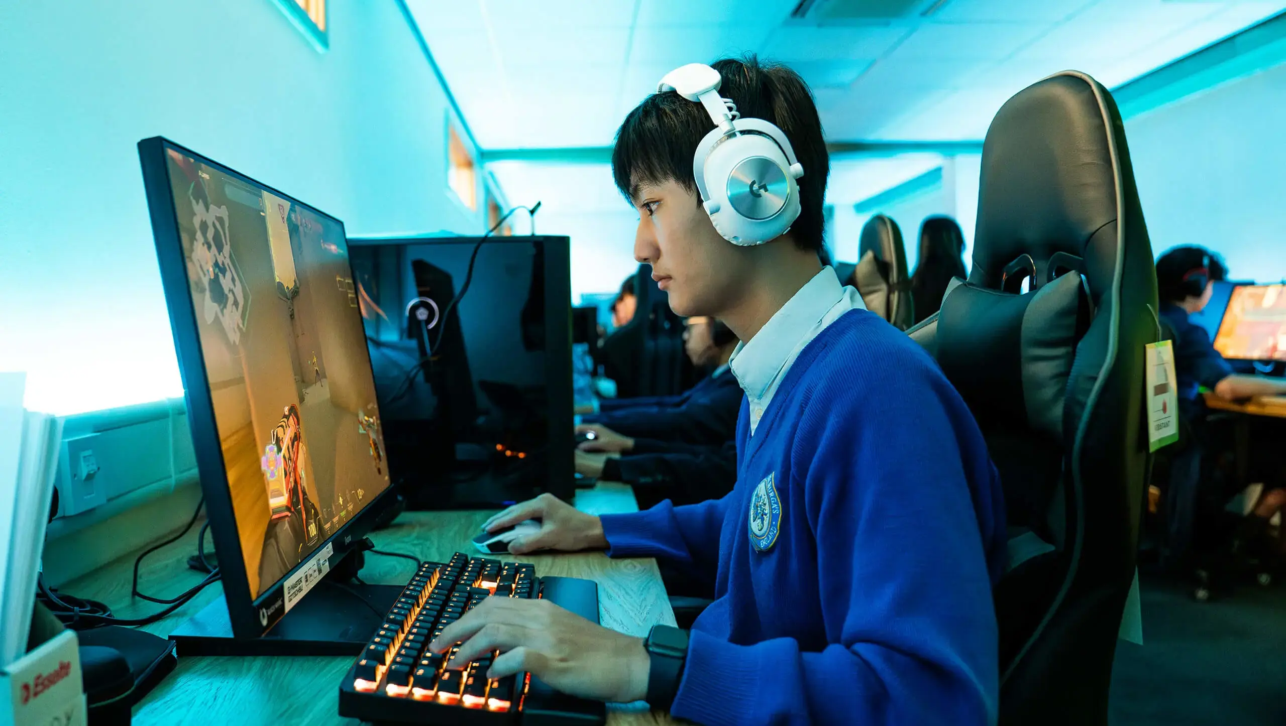 Senior school student playing a video game