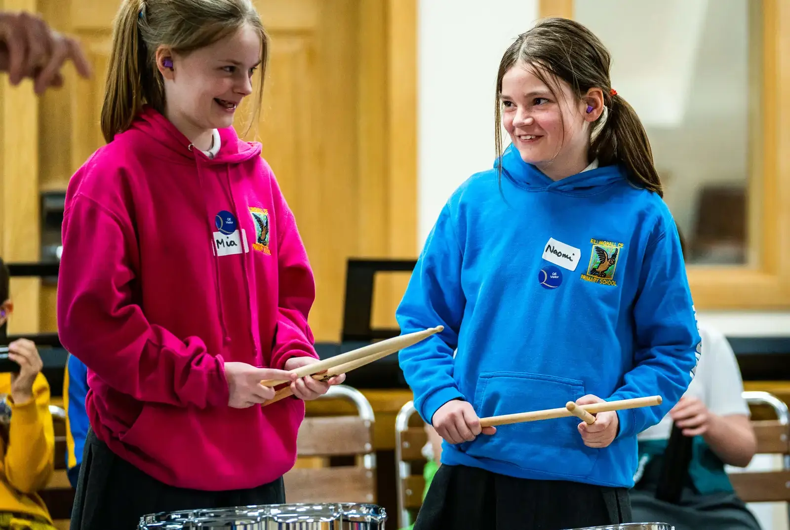 Queen Ethelburga's pupils playing drums together