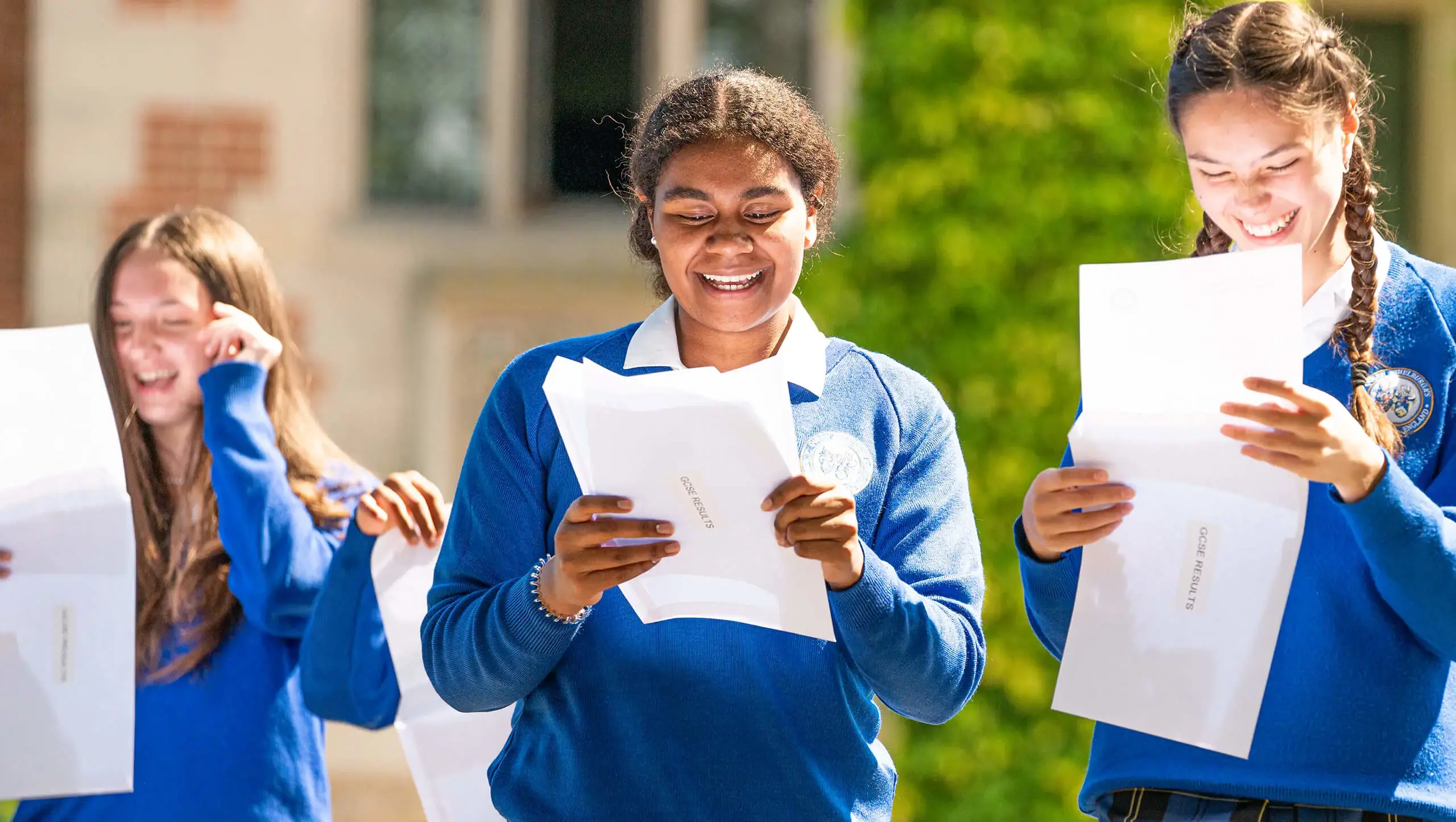 Senior school students at Queen Ethelburga's celebrating exam results