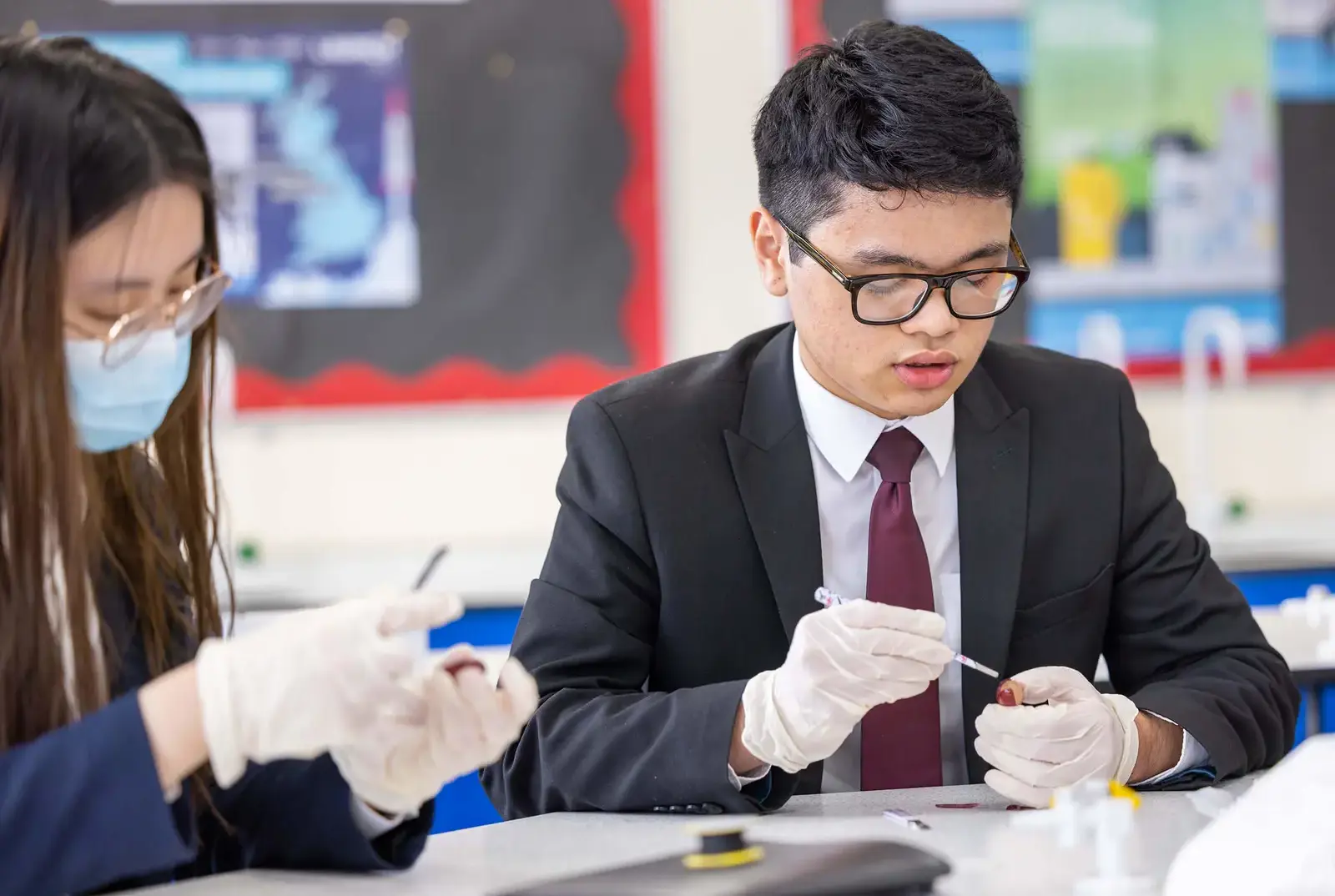 International students working in class at QE Faculty