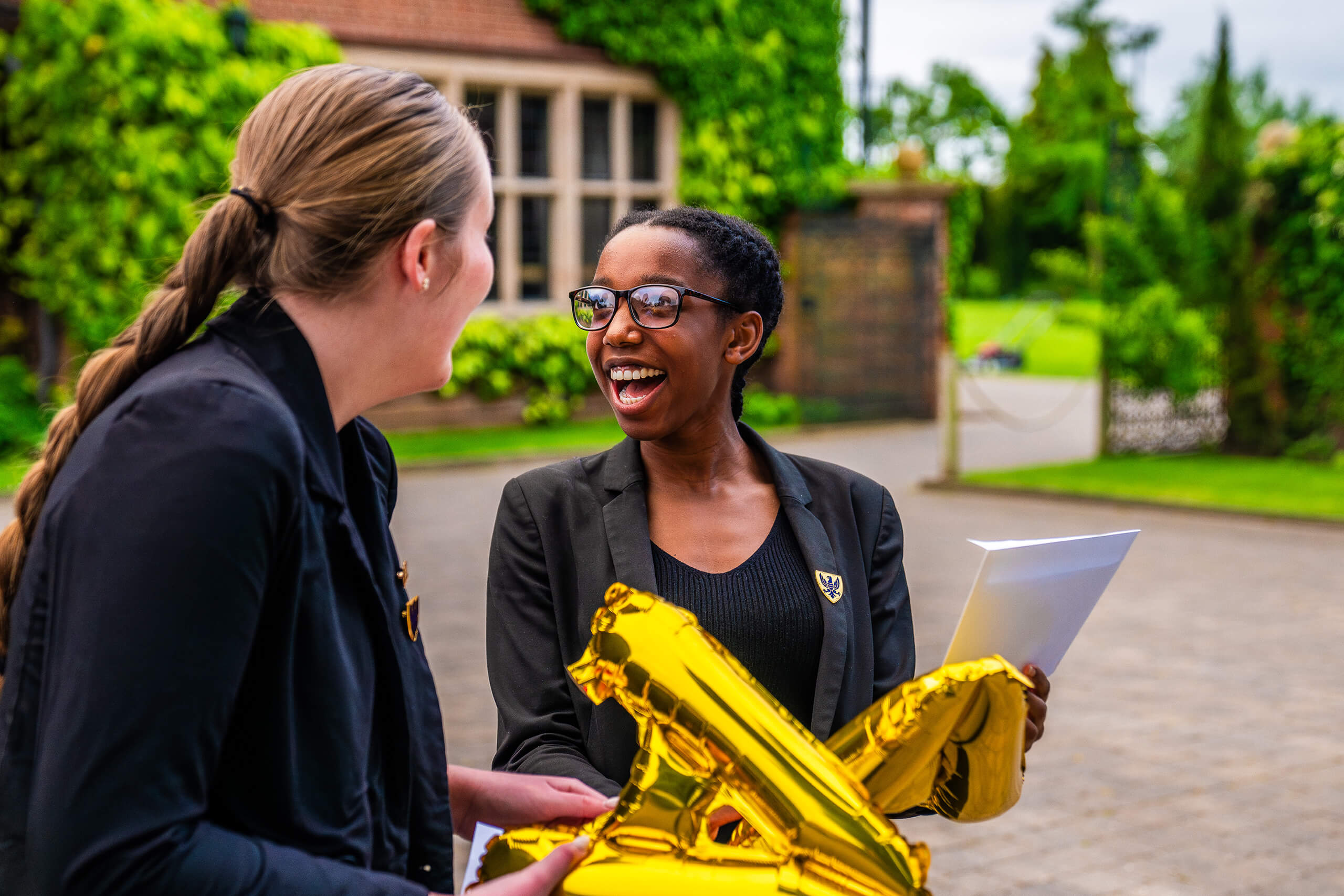 Georgia celebrating achieving A*A*AA