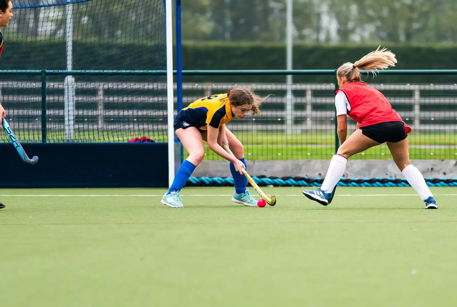 Girls playing hockey at QE