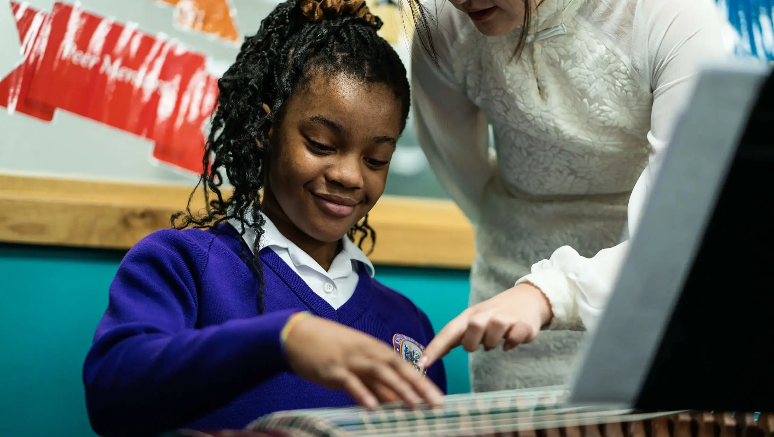 Female pupil at King's Magna Middle School studying in class