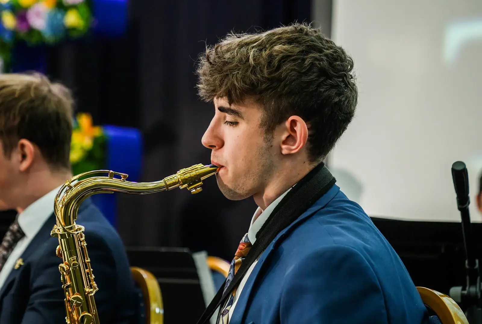 Senior school pupil at Qyeen Ethelburga's playing the saxophone