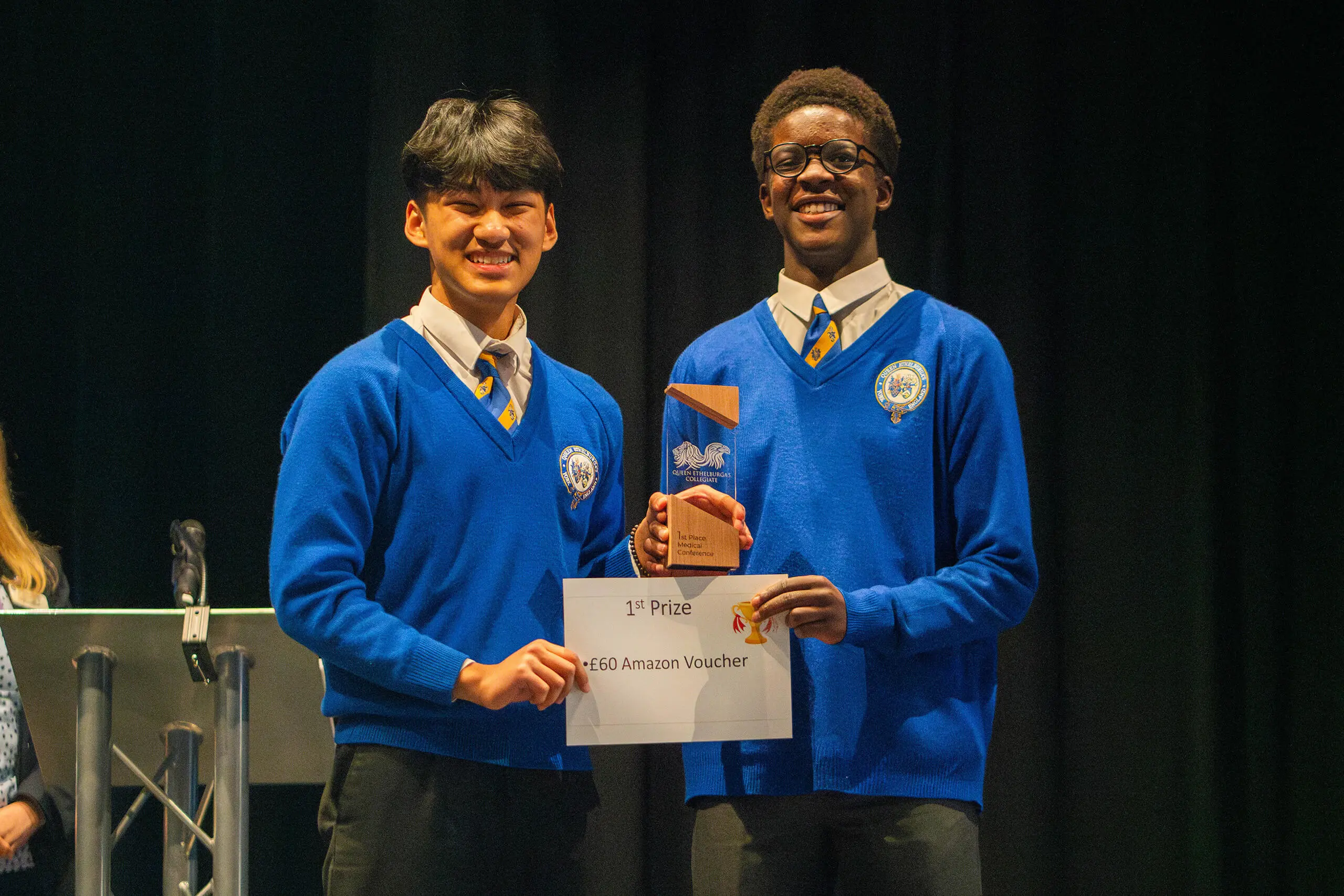 Students winning a prize at the Medical Conference