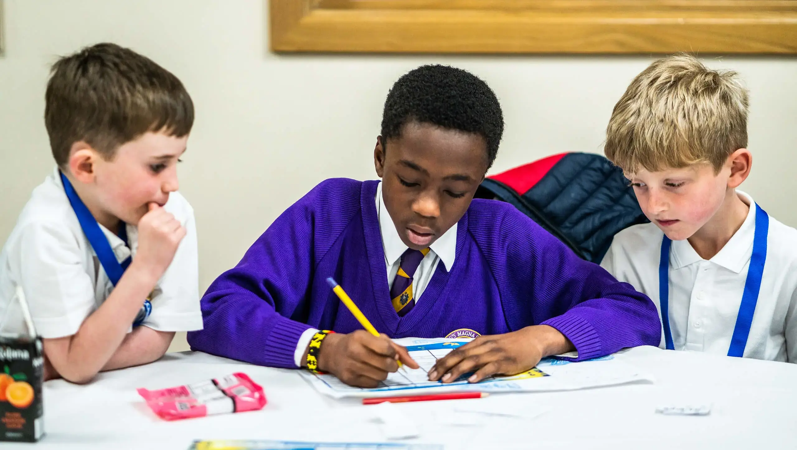 King's Magna pupil with young peers in class