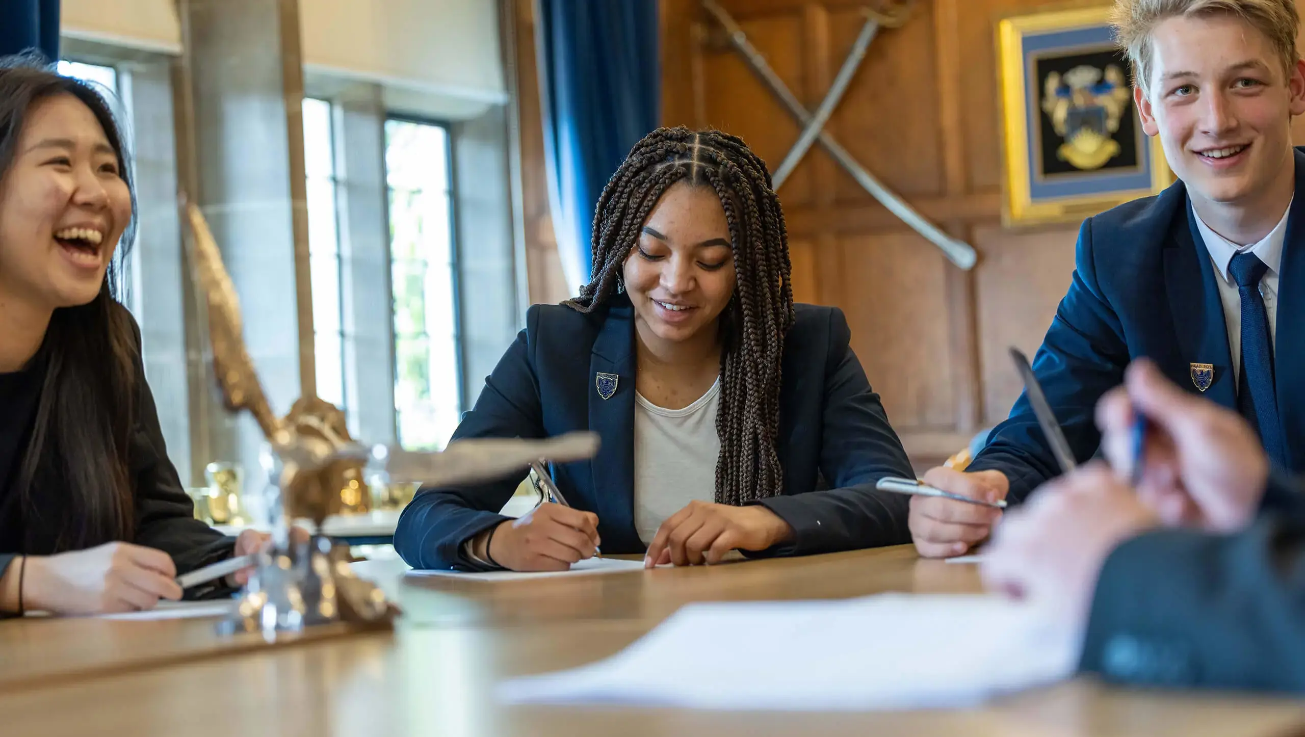 QE College pupils studying in class at Queen Ethelburga's