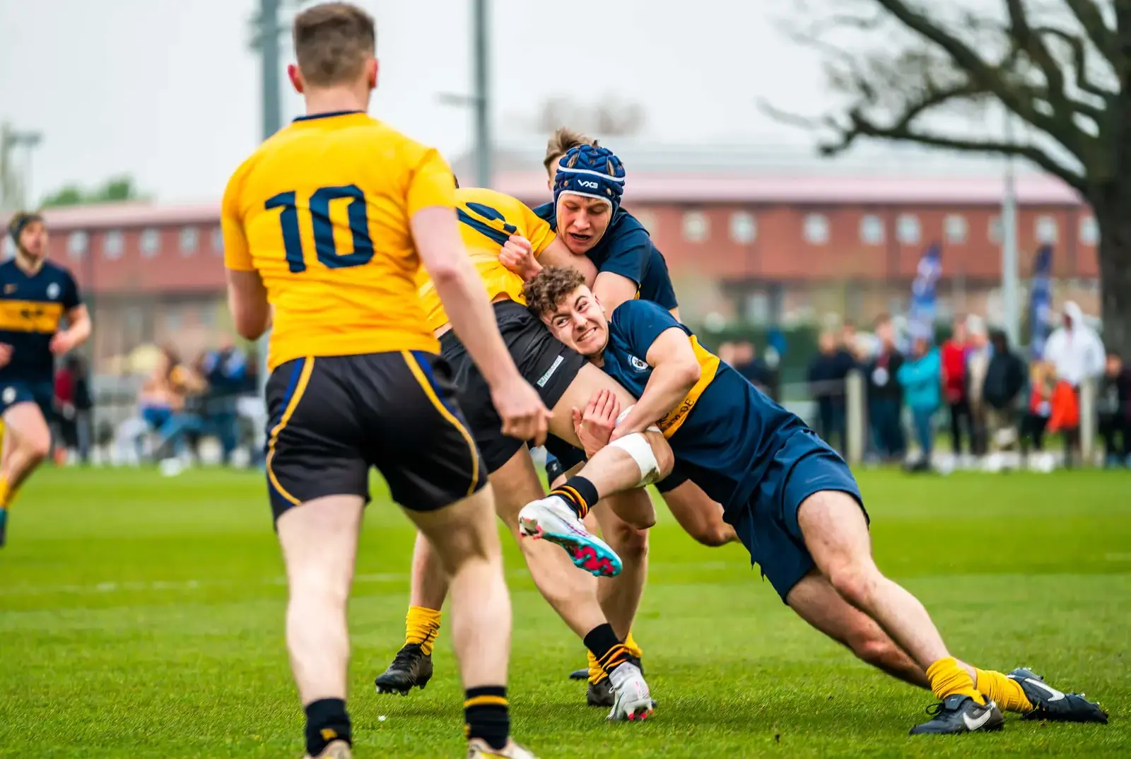 QE Faculty pupils playing rugby