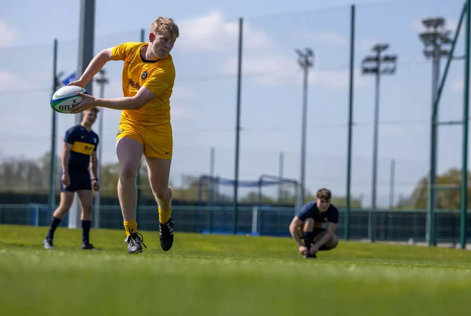 QE pupils playing rugby