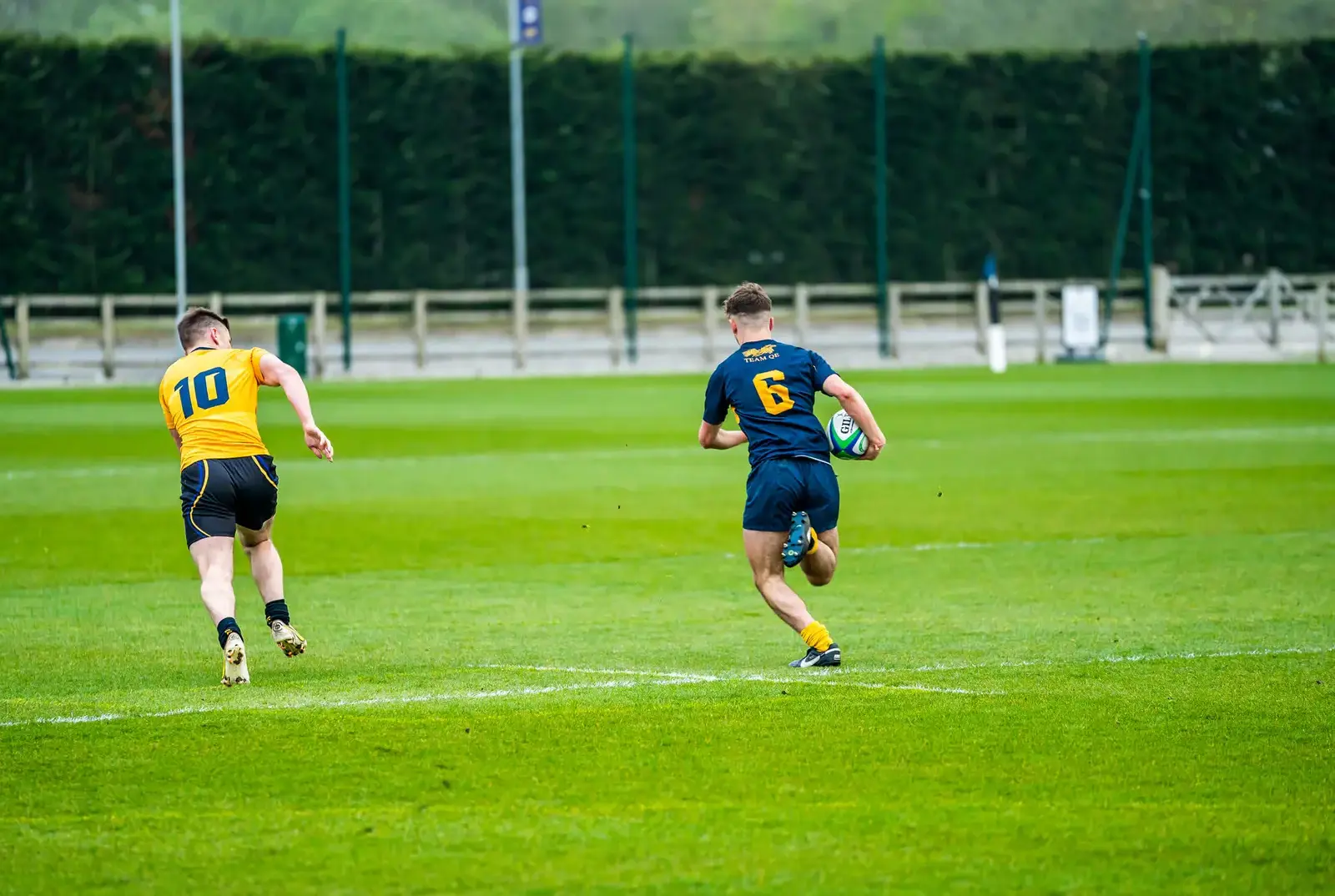 QE pupils playing rugby